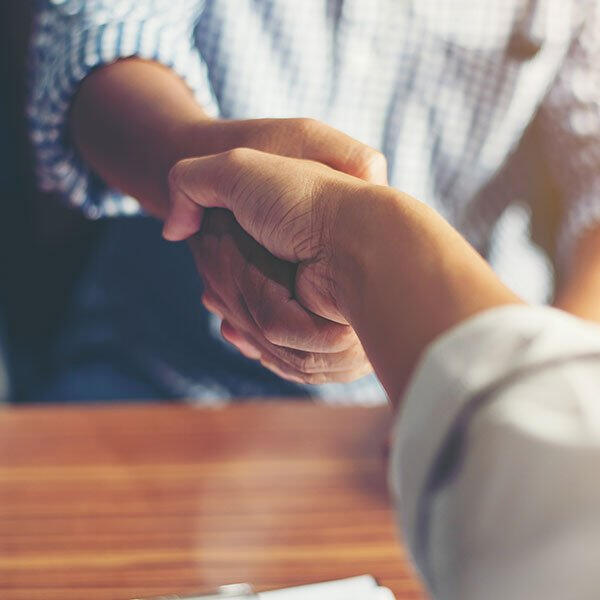 Two people shaking hands